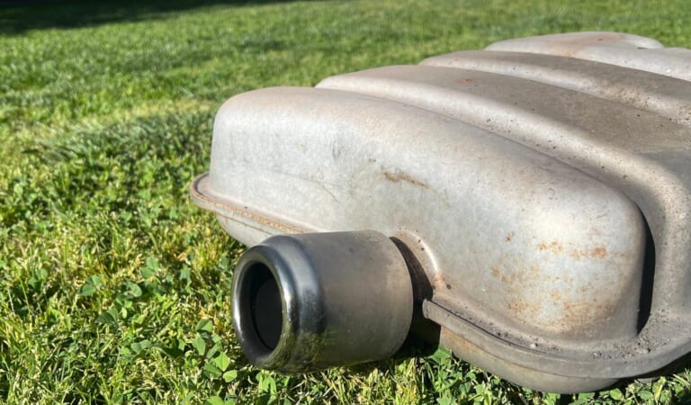 The First-Gen Mini Cooper’s Exhaust Tips Were Modeled After A Can Of Budweiser